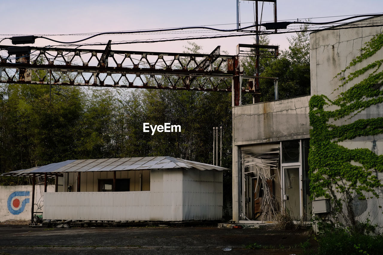 BUILT STRUCTURE AGAINST TREES