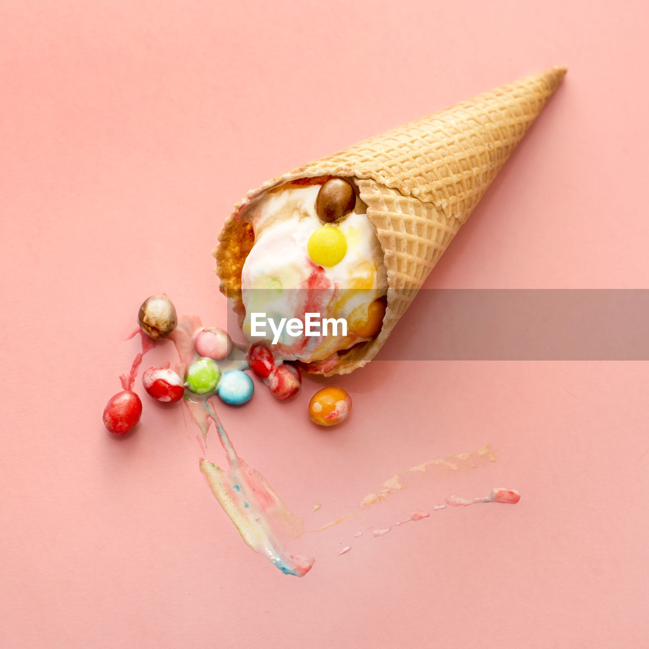Ice cream cone on colored background