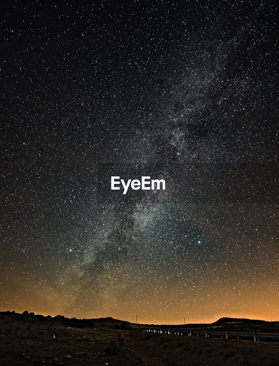 Scenic view of star field against sky at night