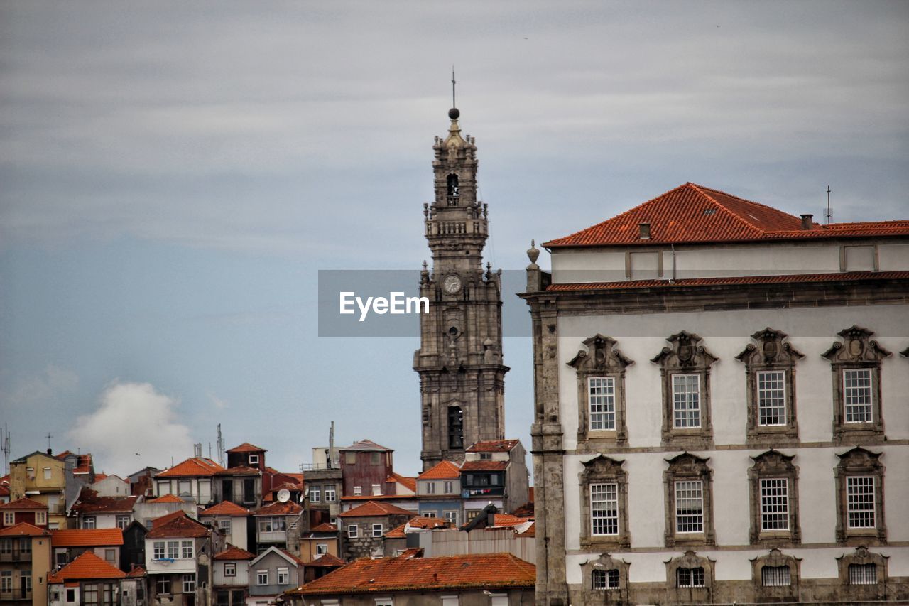 View of buildings in city against sky