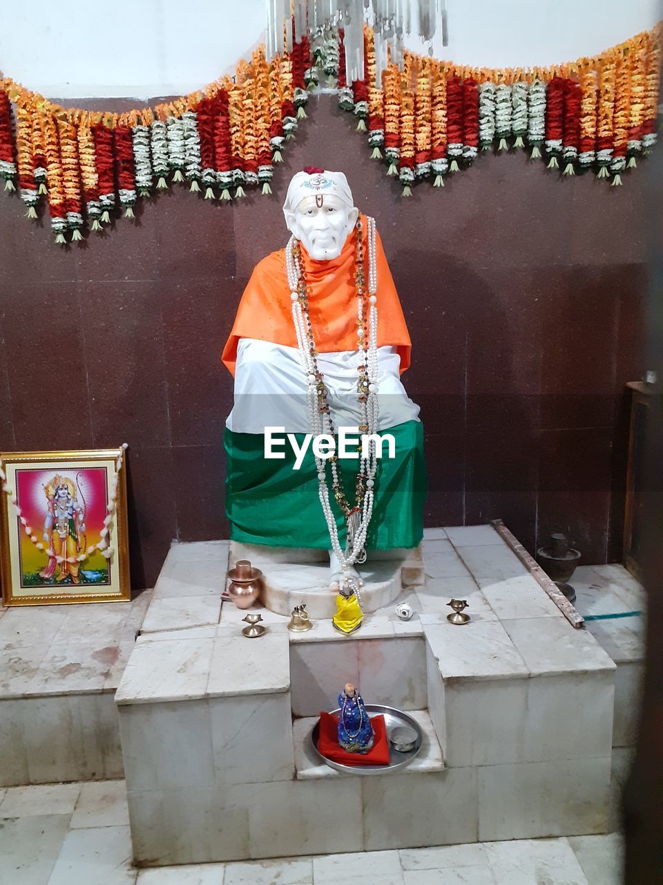Midsection of man standing in temple