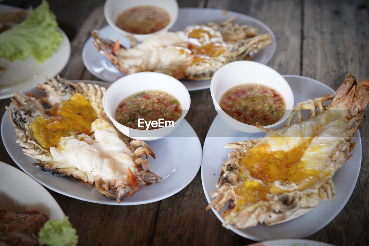 CLOSE-UP OF FOOD SERVED ON TABLE