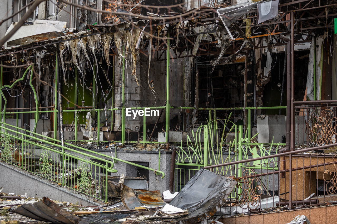 Destroyed buildings on the streets of irpen. broken, shelled windows.