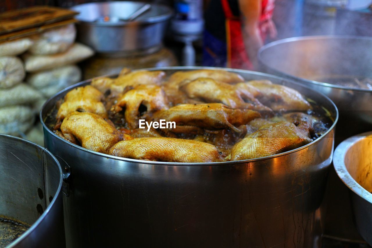 Close-up of meat in cooking pan