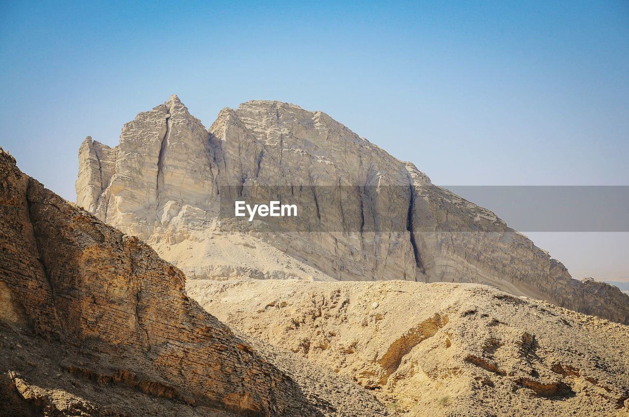 Scenic view of mountains against clear sky