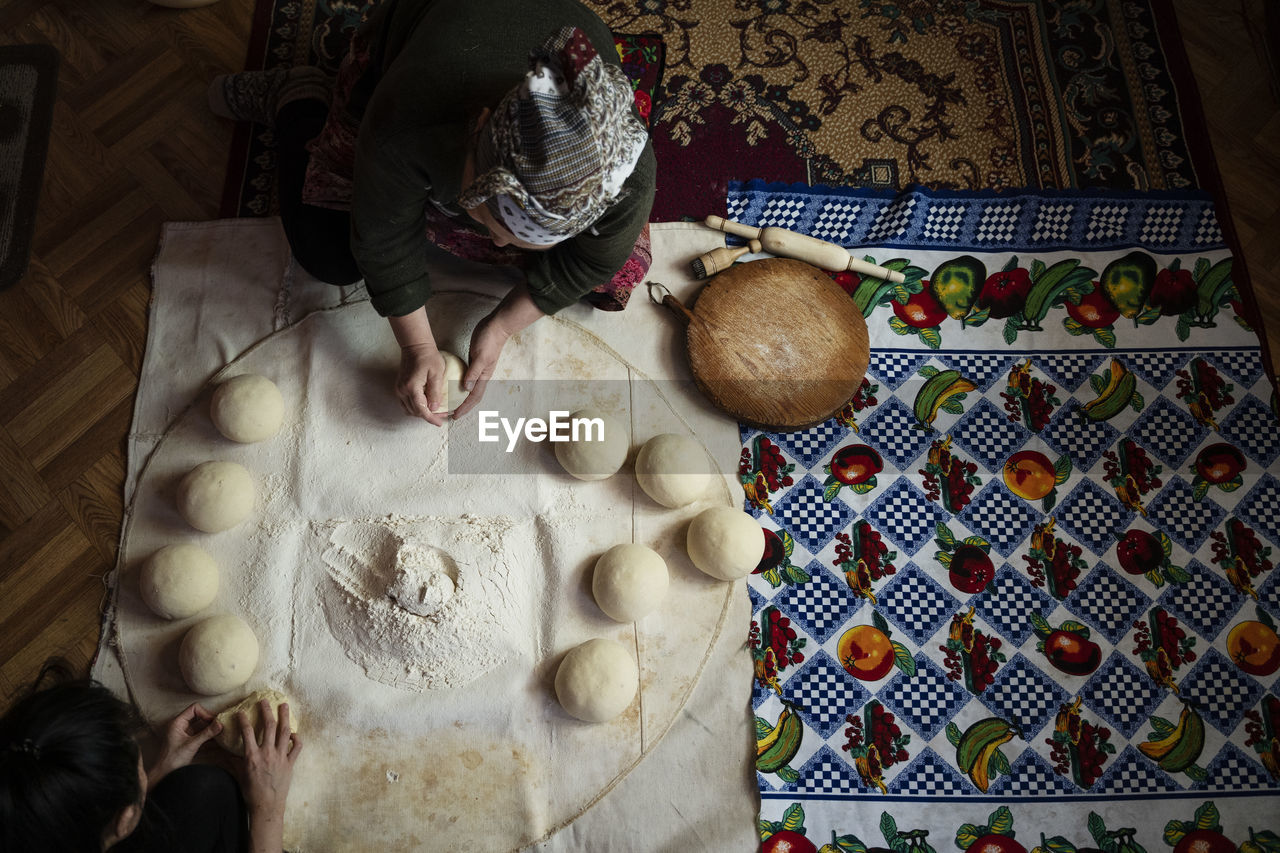 High angle view of woman preparing food at home