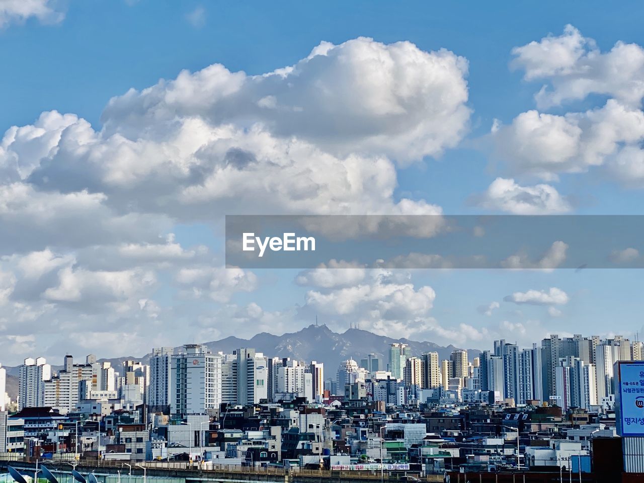 Buildings in city against sky