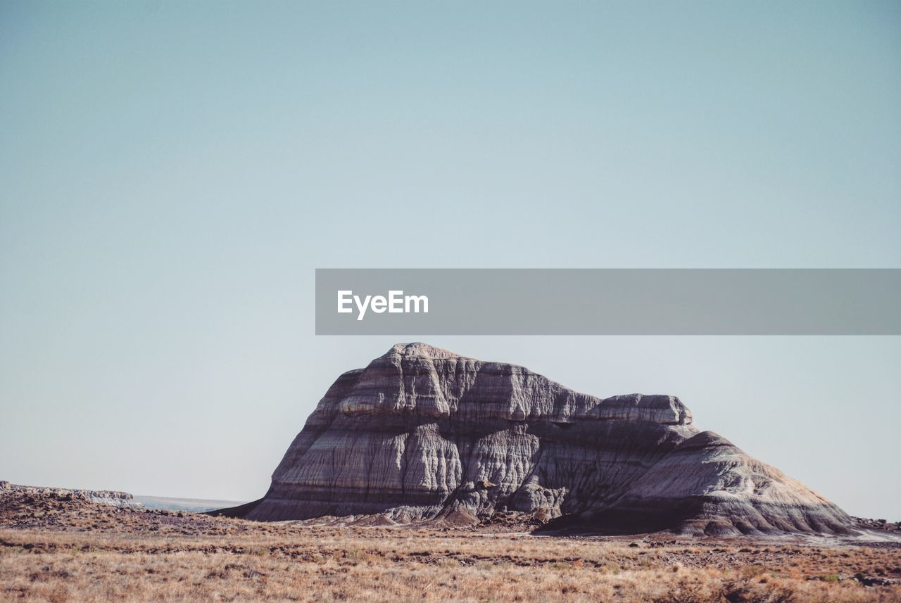 Rock formation against clear sky