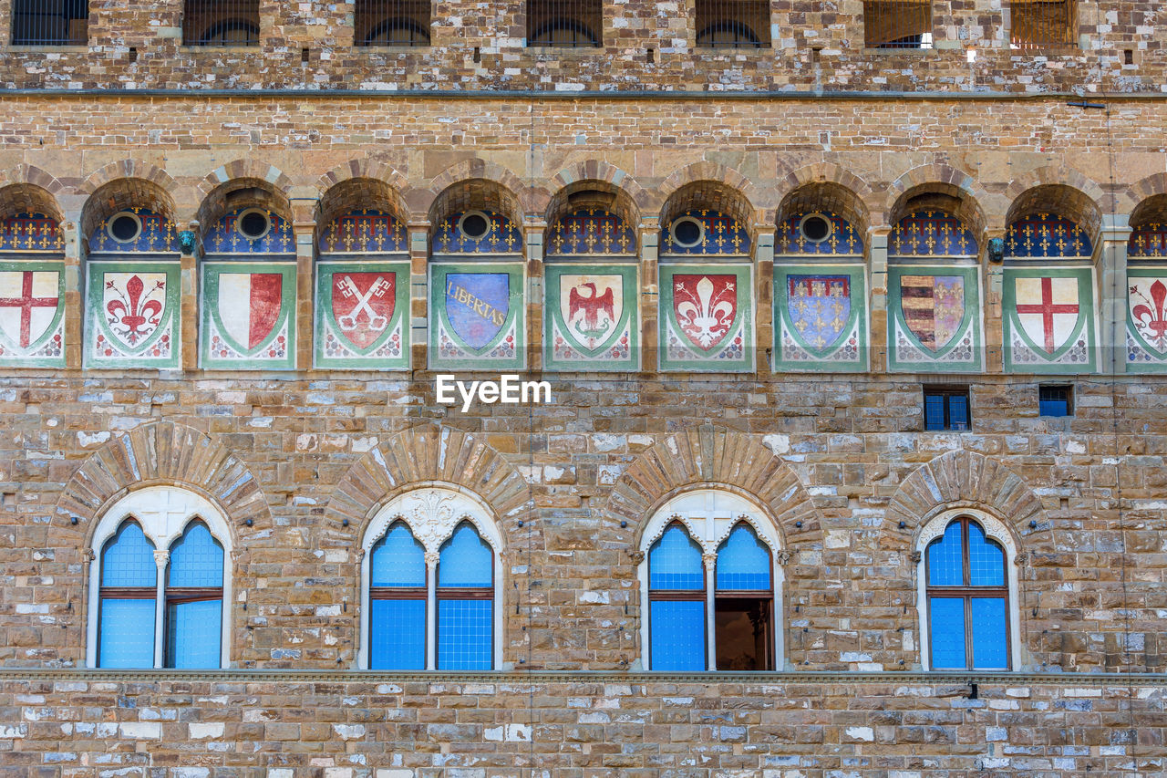 Wall with coats of arms on a palace