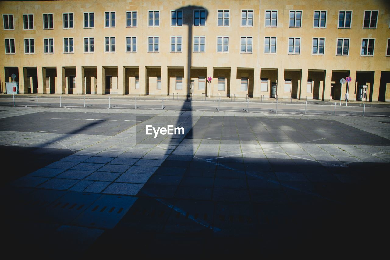 Shadow on street and building