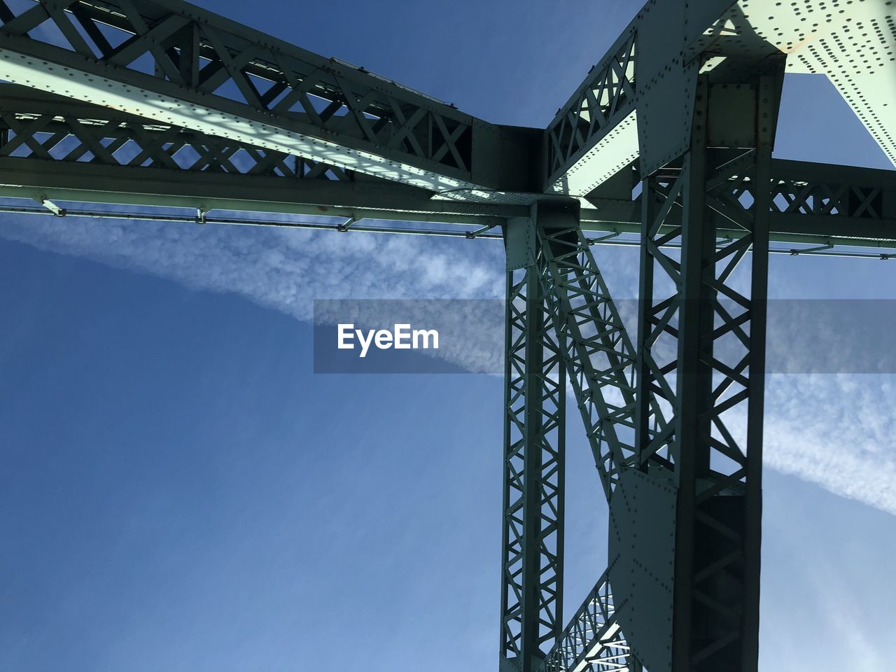 LOW ANGLE VIEW OF BRIDGE AGAINST CLEAR SKY
