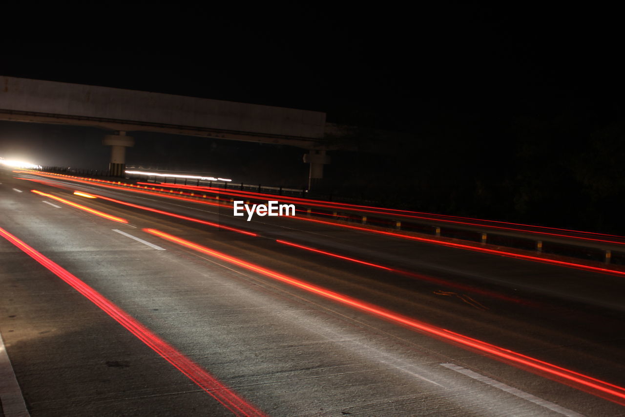 Light trails on road at night