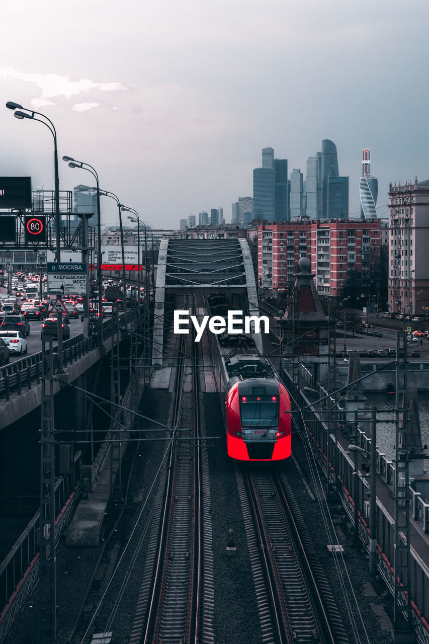 High angle view of train on railroad tracks in city