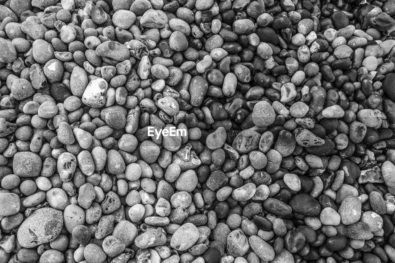 Full frame shot of pebbles at shore