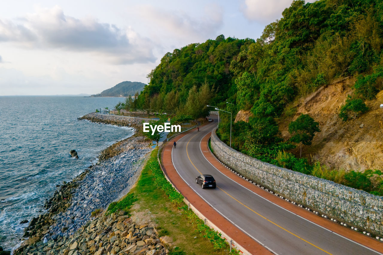 high angle view of road by mountain against sky