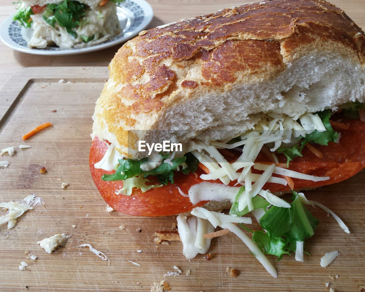 Close-up of pepperoni sandwich on cutting board