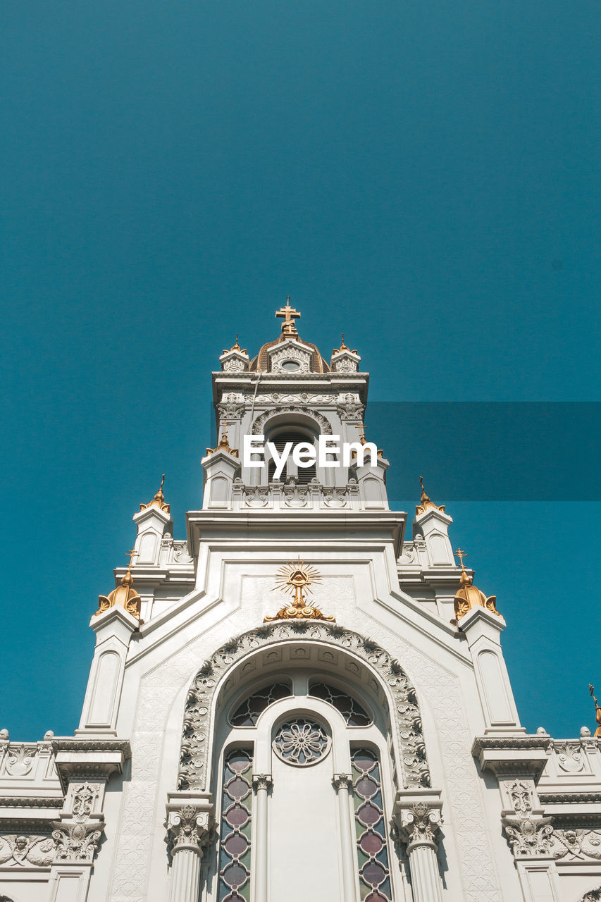 LOW ANGLE VIEW OF CATHEDRAL AGAINST CLEAR SKY