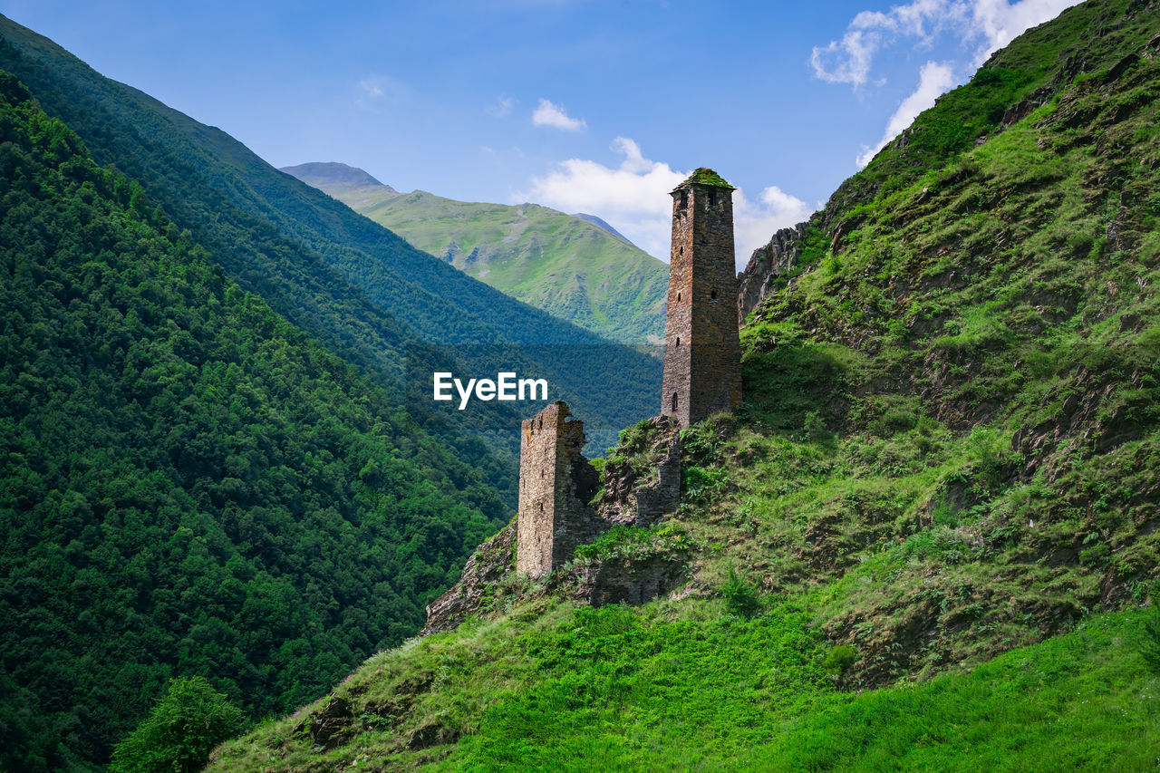 Ancient historical tower of chechens in the mountains of the caucasus. the village of meshi.