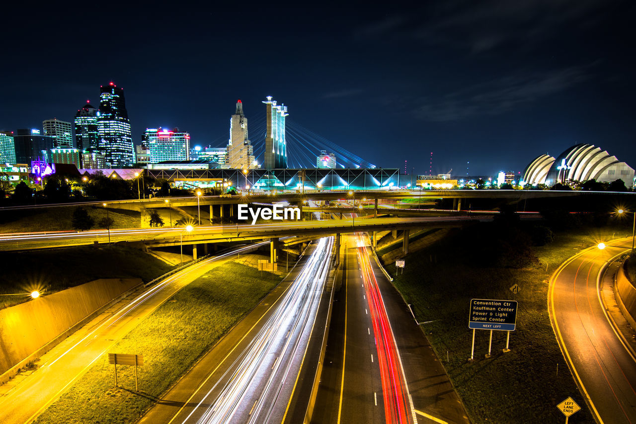 Light trails against built structures