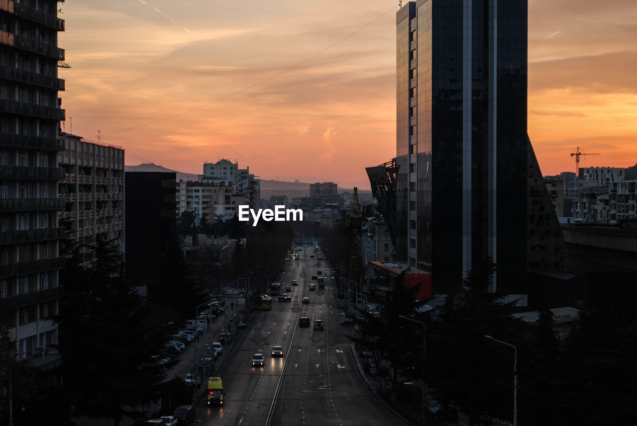 VIEW OF CITY AT SUNSET