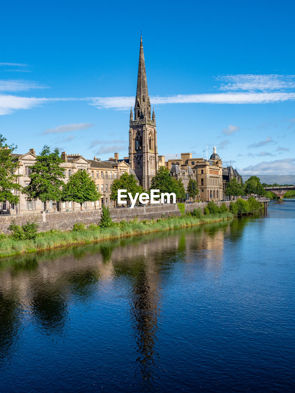 St matthews church reflects in the river tay, perth, scotland