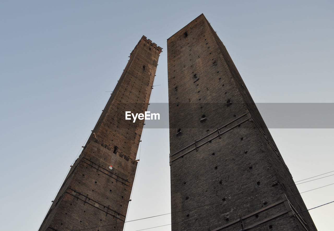 low angle view of old building against clear sky