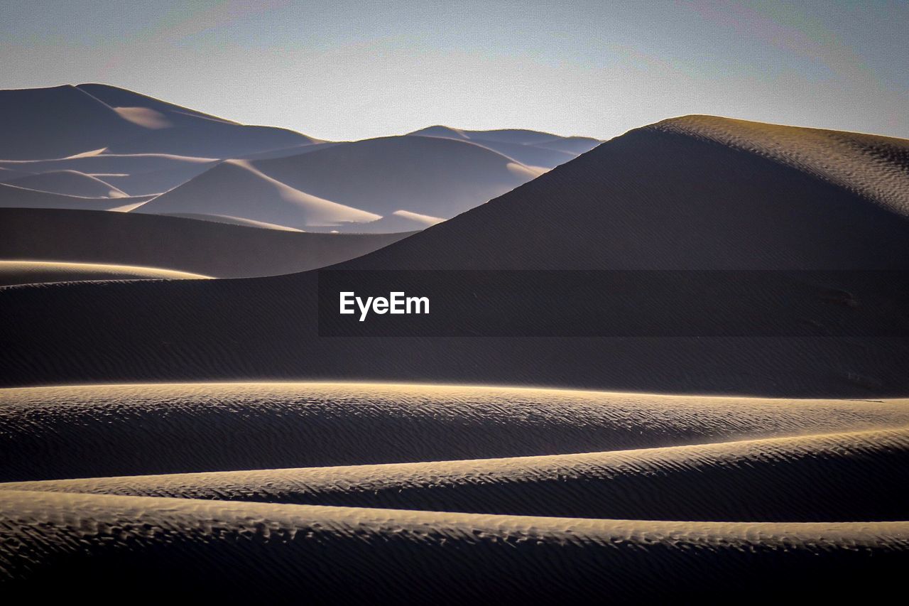 Scenic view of desert against sky