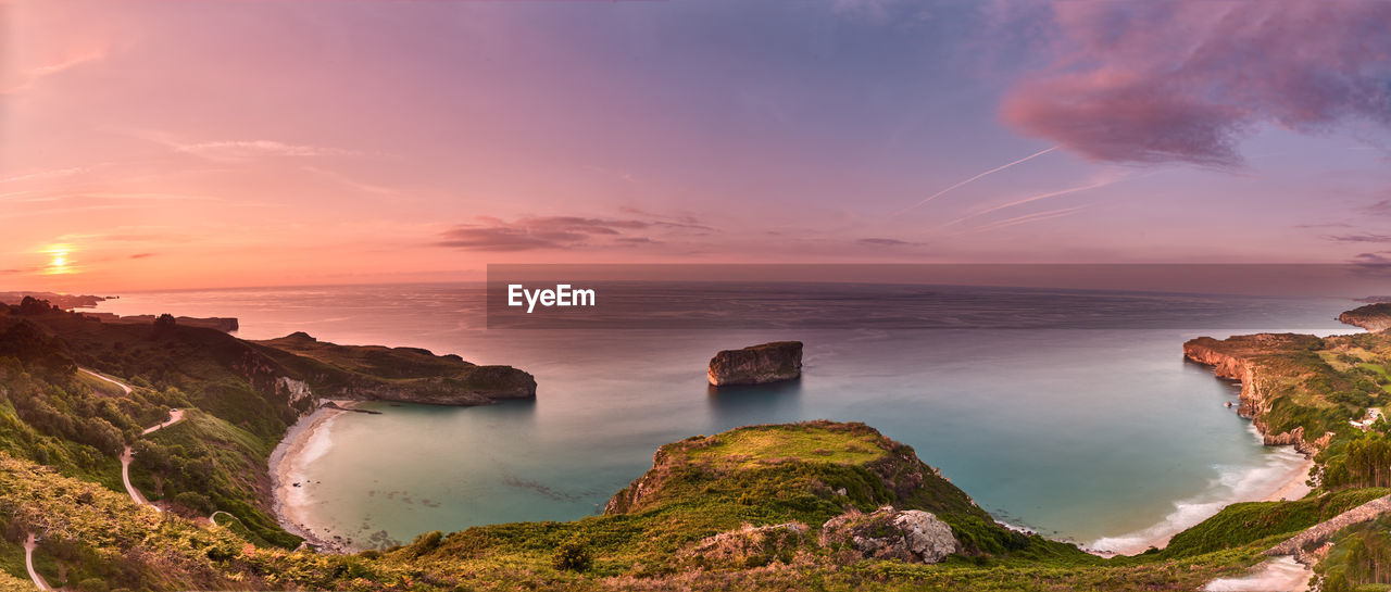 Panoramic view of sea against sky during sunset