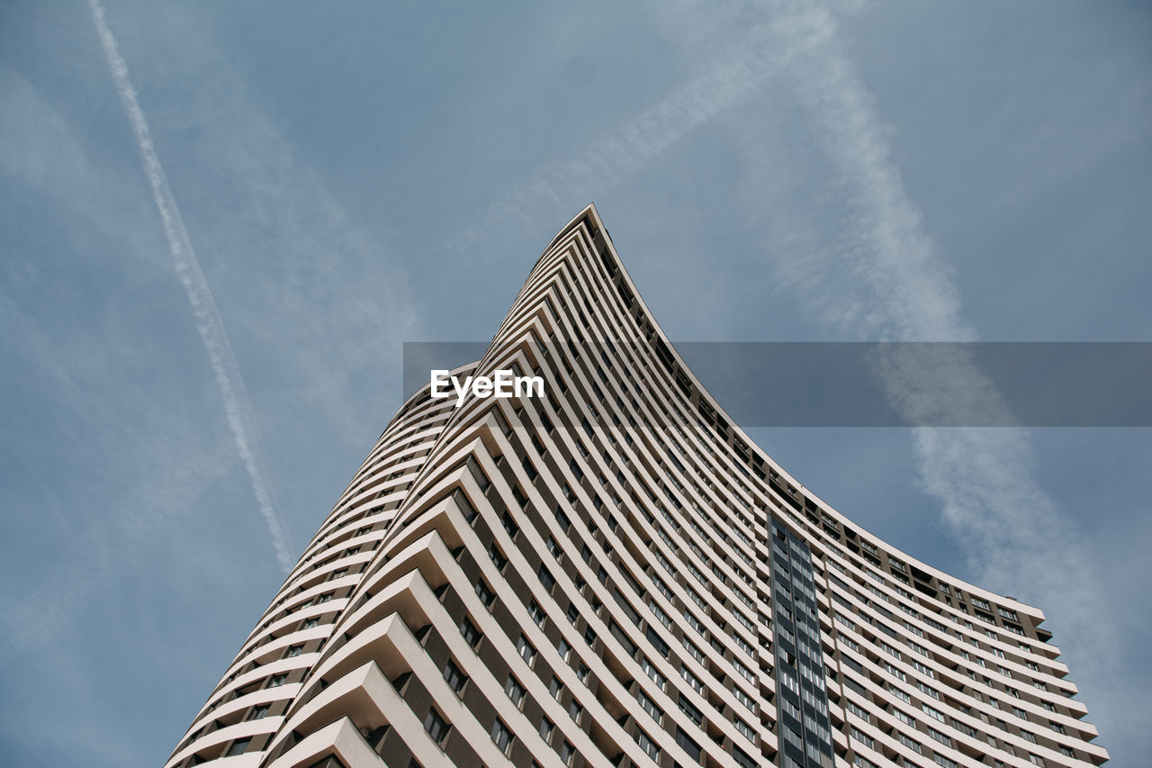 Low angle view of skyscraper against sky