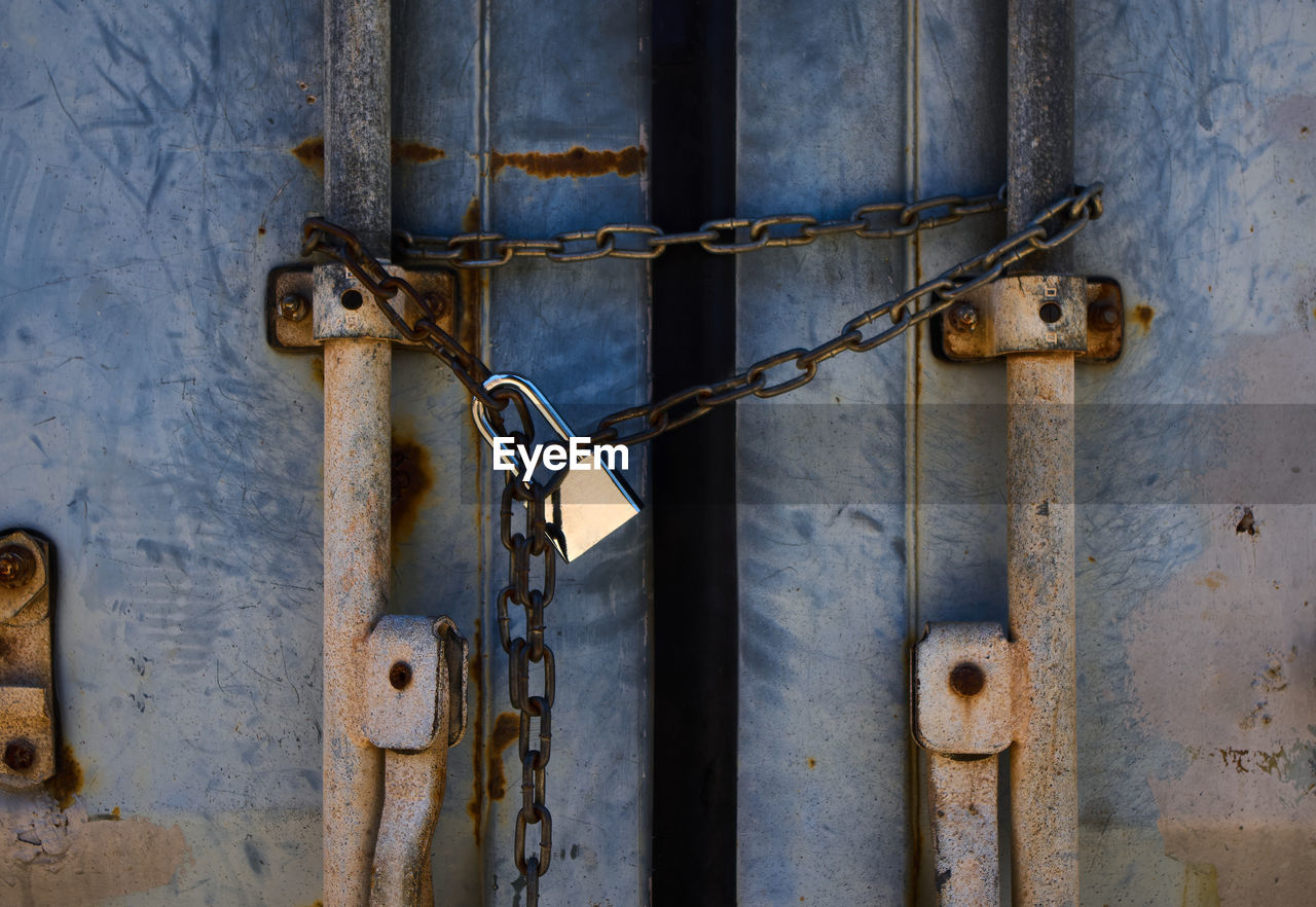 Old rusty lock on the door