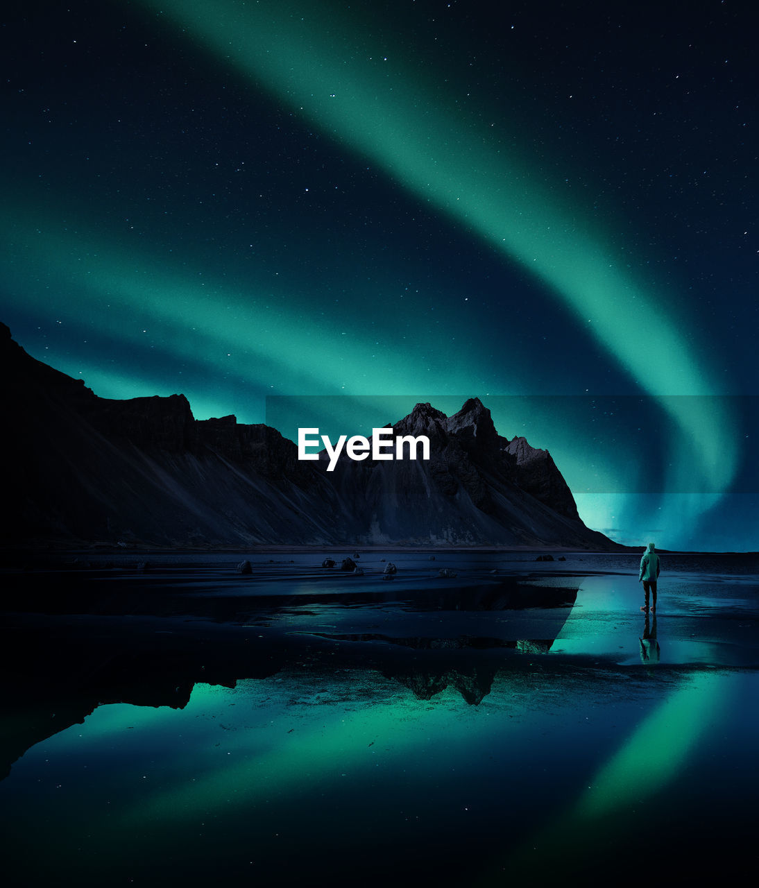 SCENIC VIEW OF SNOWCAPPED MOUNTAINS AGAINST SKY AT NIGHT DURING WINTER