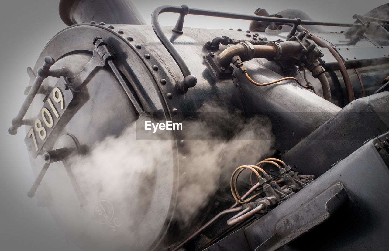Low angle view of steam train