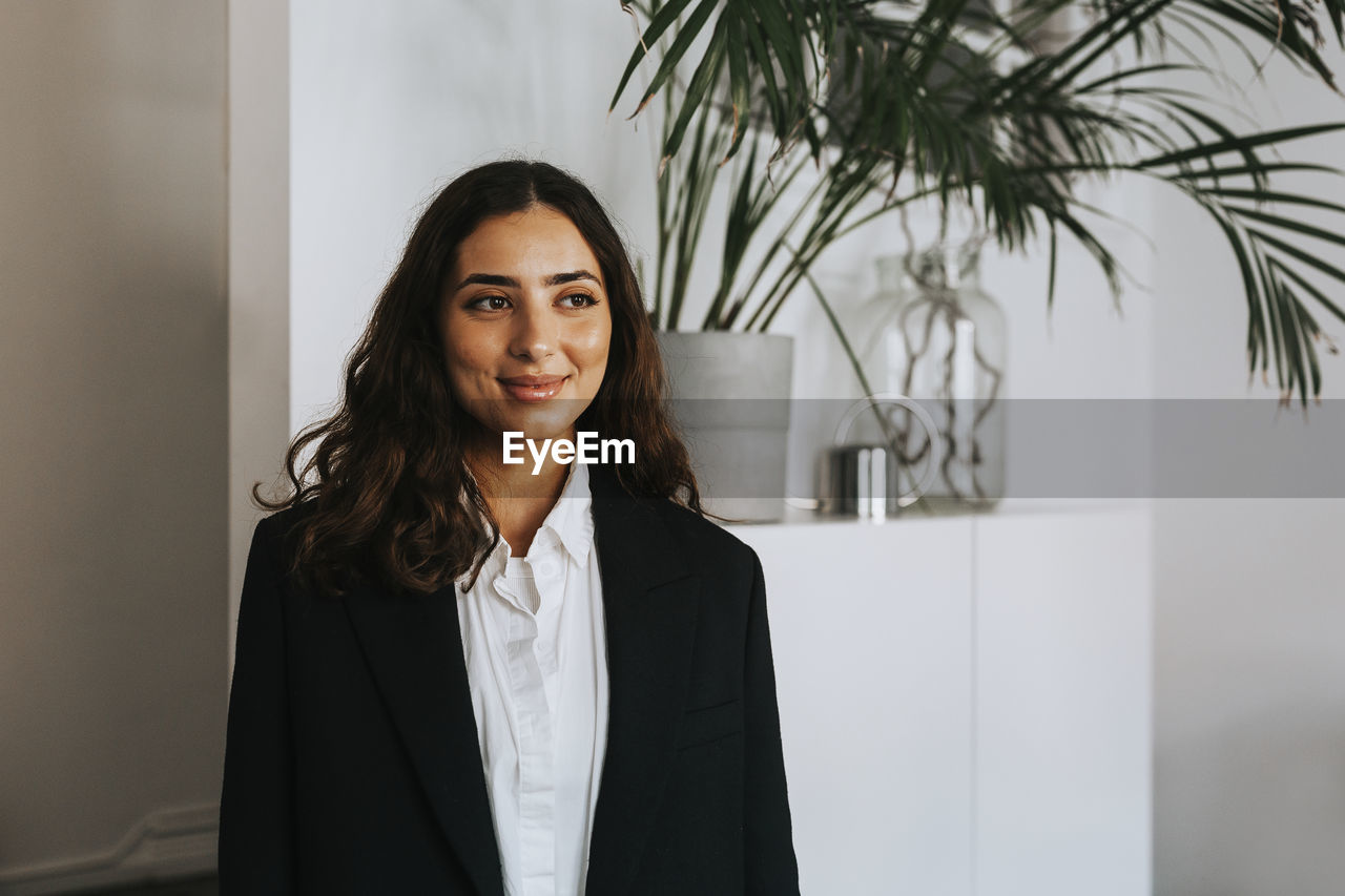 Smiling woman in office