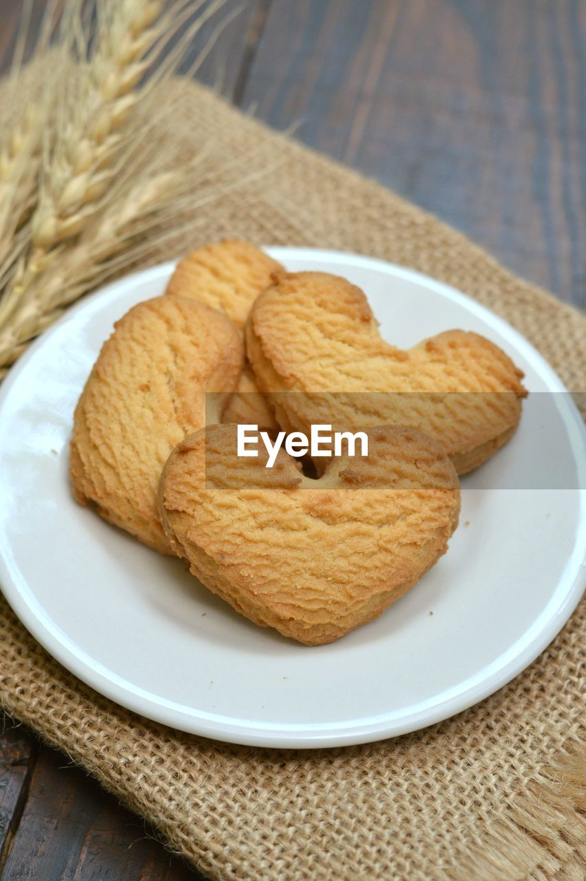 Heart shaped cookies in the white plate 