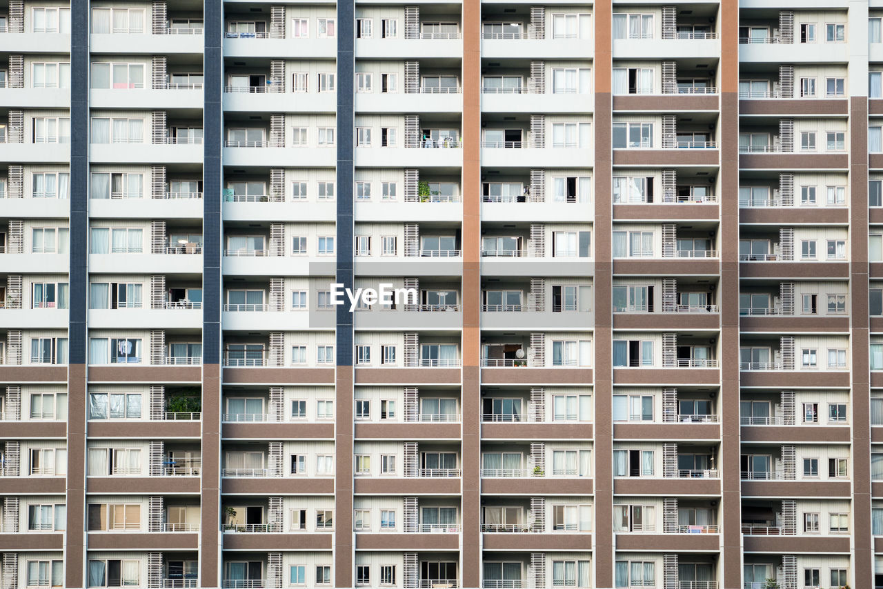 Full frame shot of apartment building facade