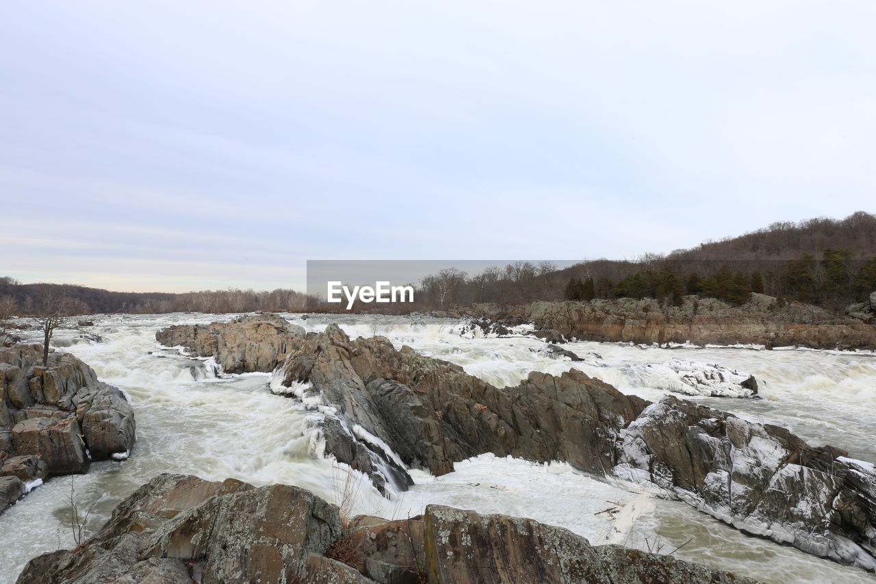 SCENIC VIEW OF SNOW COVERED LAND