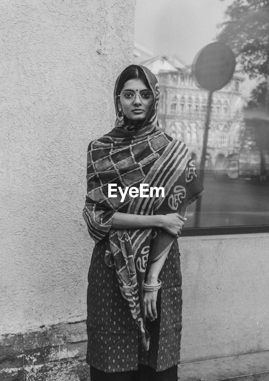 Old portrait of young cultured indian woman standing 