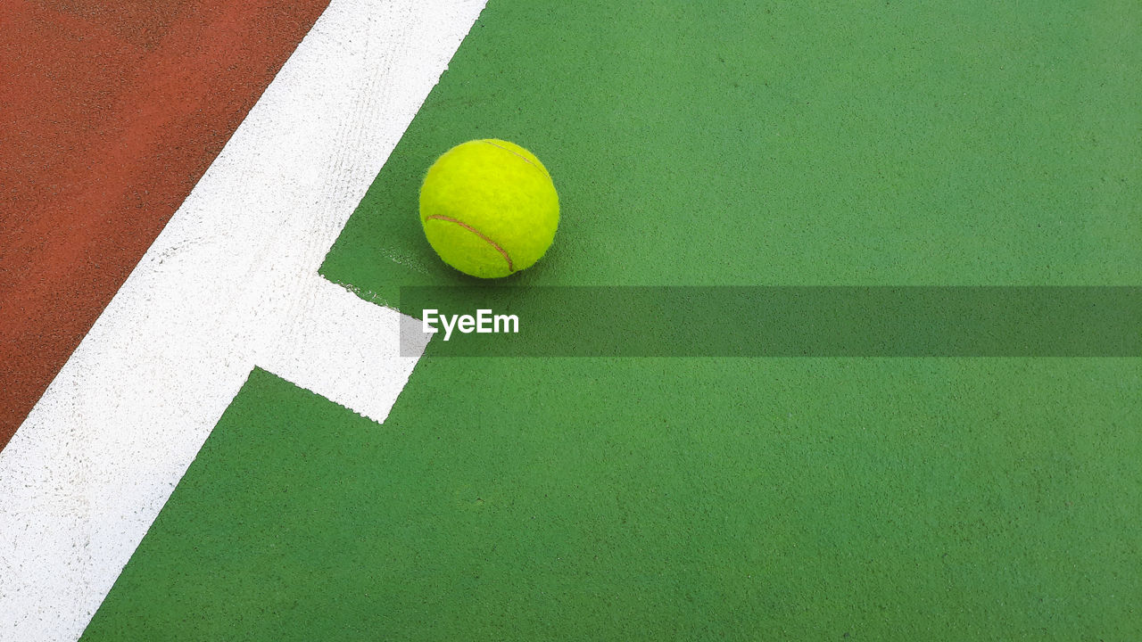 High angle view of tennis ball on tennis court
