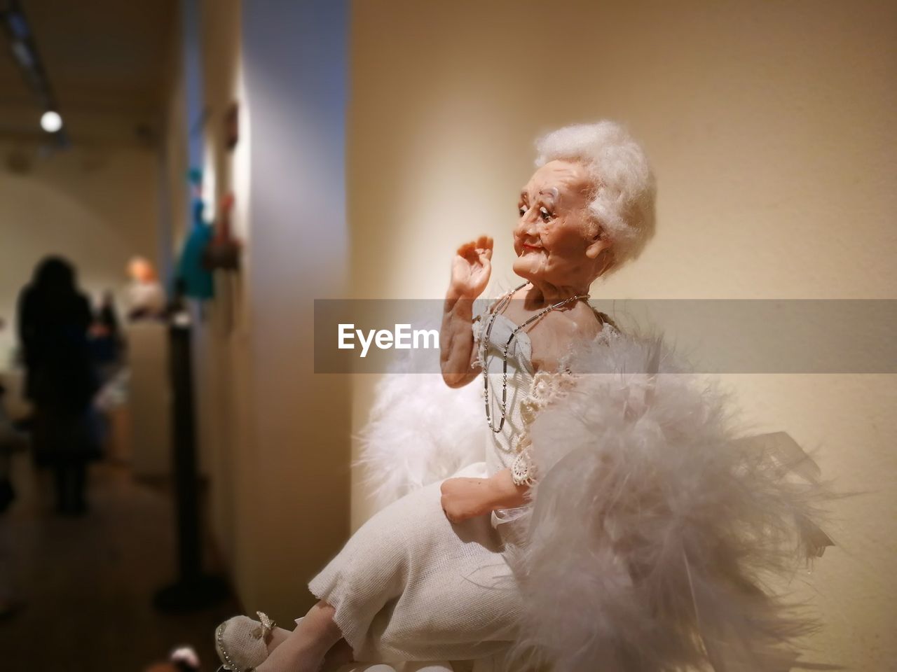 WOMAN LOOKING AT CAMERA AT HOME