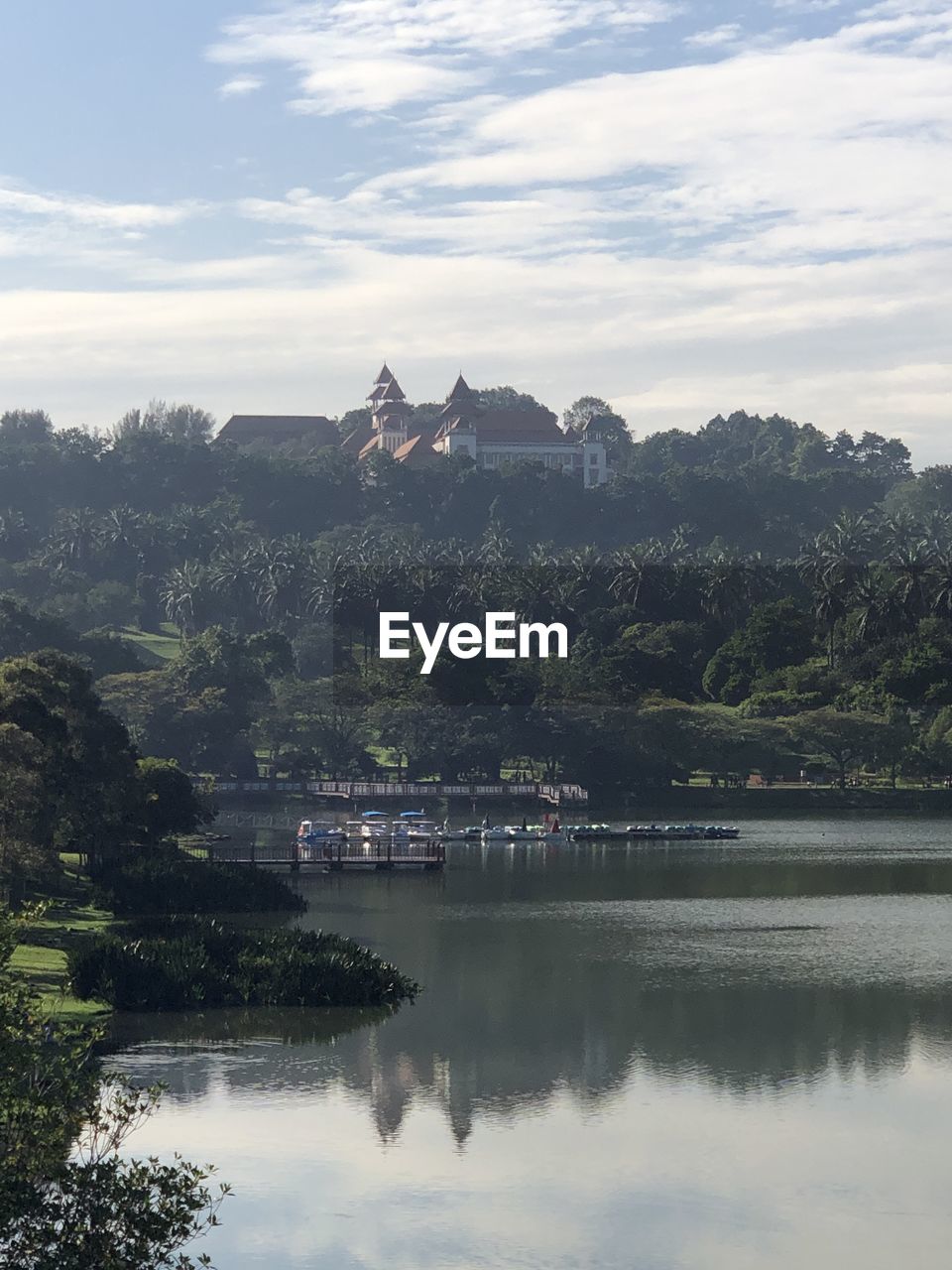 SCENIC VIEW OF LAKE WITH TREES AGAINST SKY