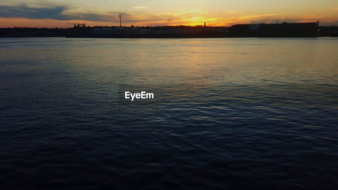 SEA AGAINST SKY DURING SUNSET