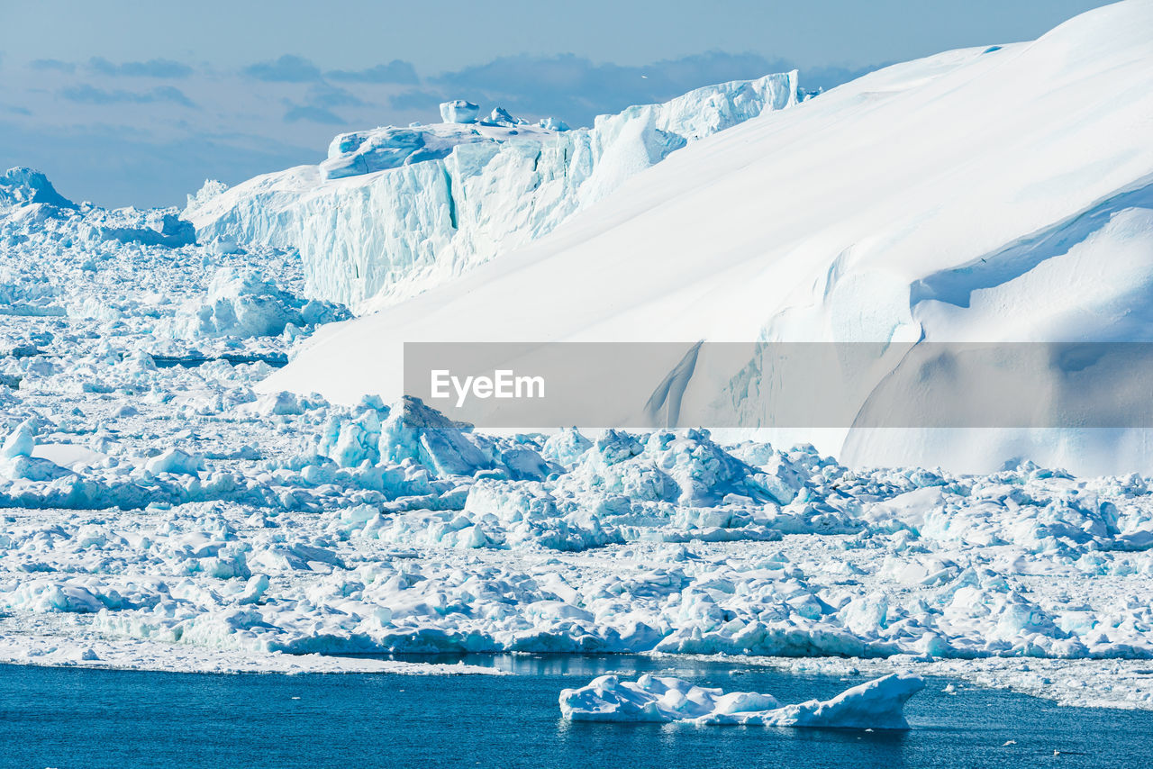 scenic view of snowcapped mountains during winter