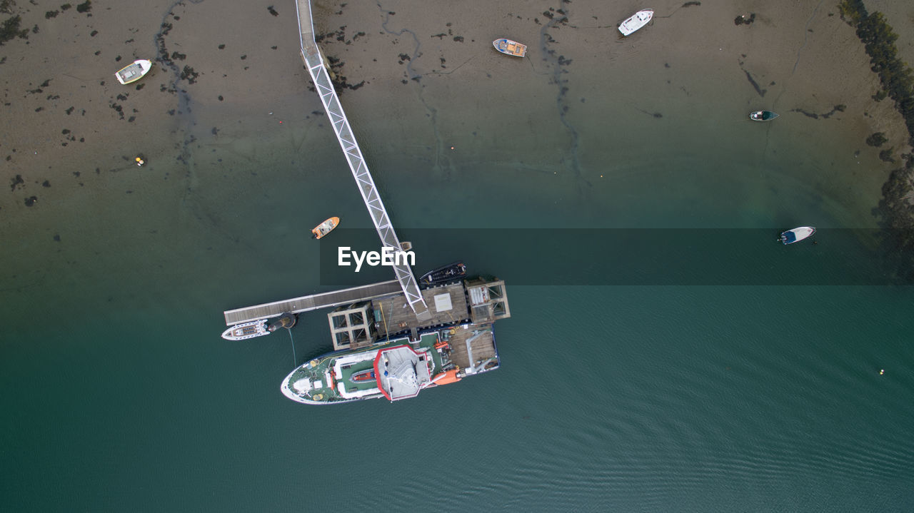 Aerial view of boats moored at shore