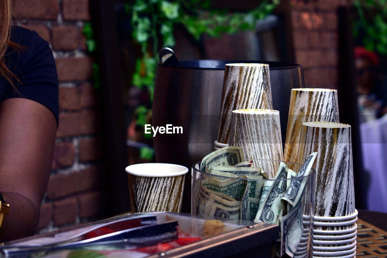 CLOSE-UP OF GLASSES ON TABLE