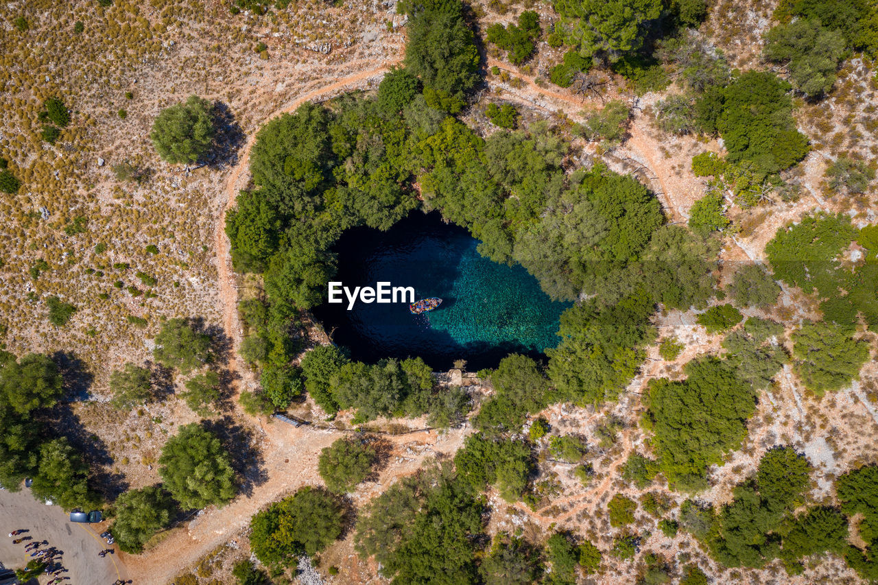 HIGH ANGLE VIEW OF A HOLE IN THE LAND