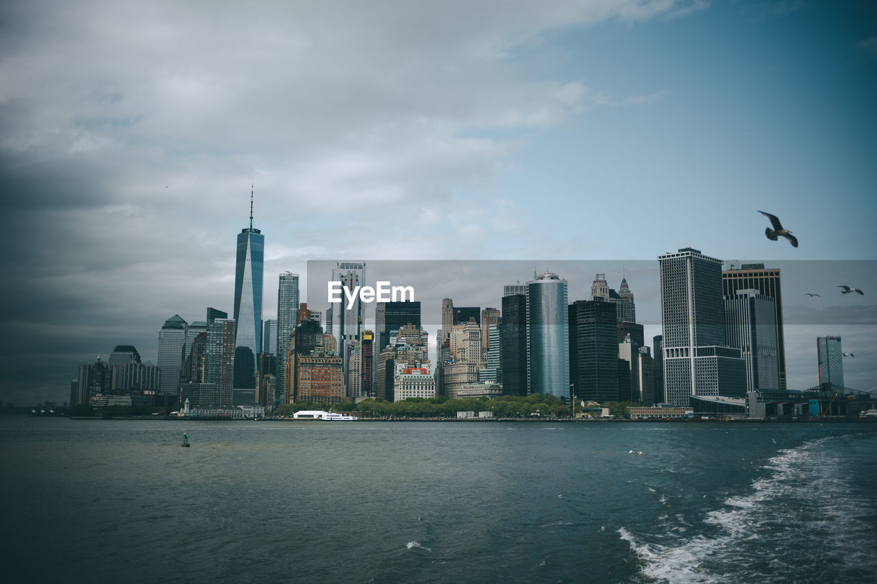 SEA AND BUILDINGS IN CITY