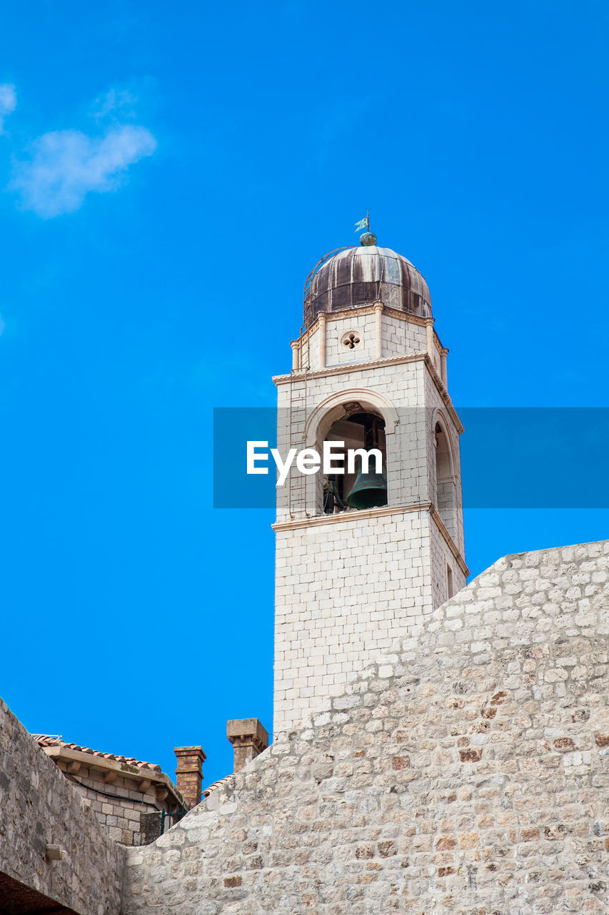 Clock tower of dubrovnik old town seen from the city old port