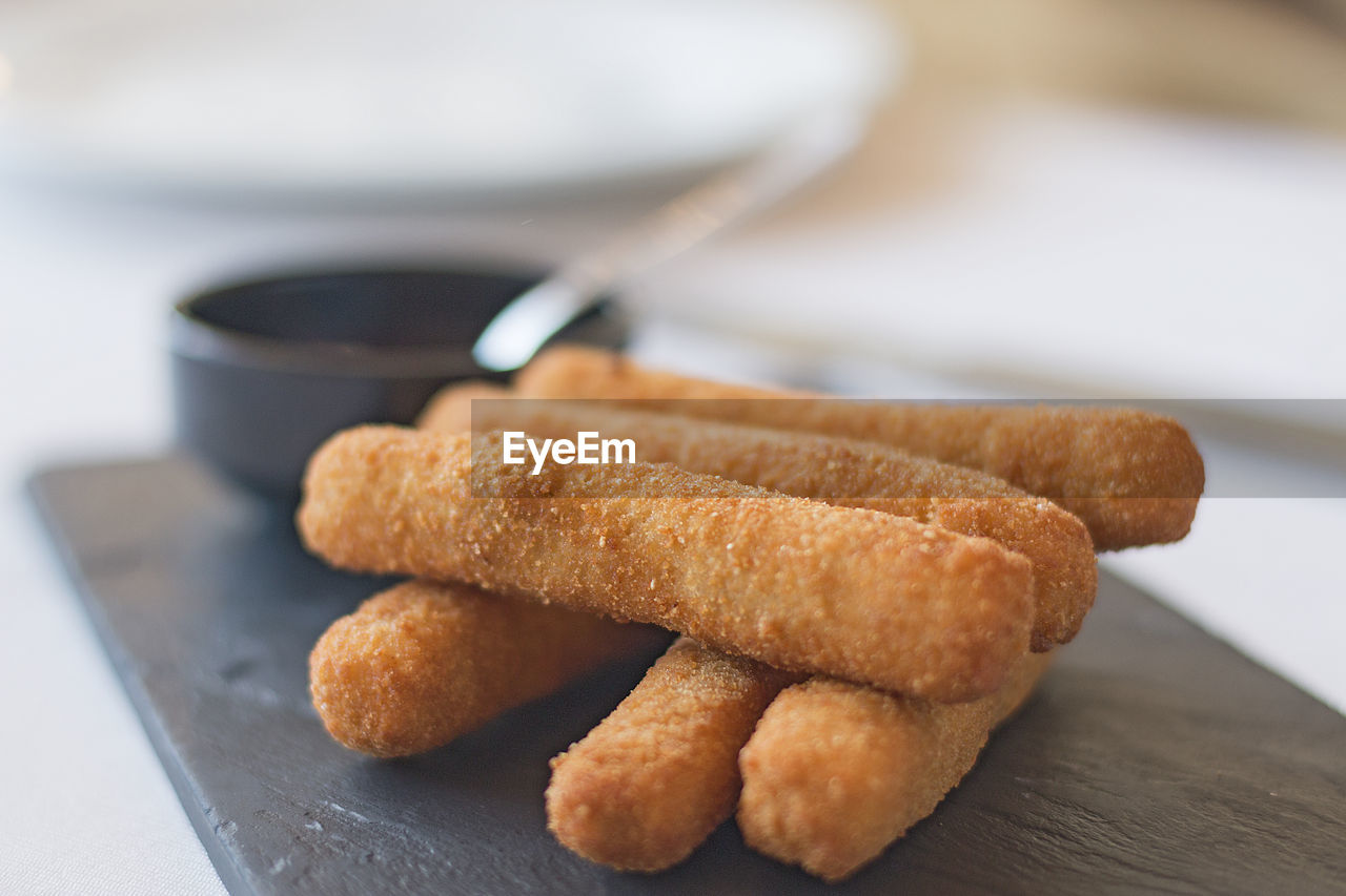 Fried mozzarella cheese fingers.