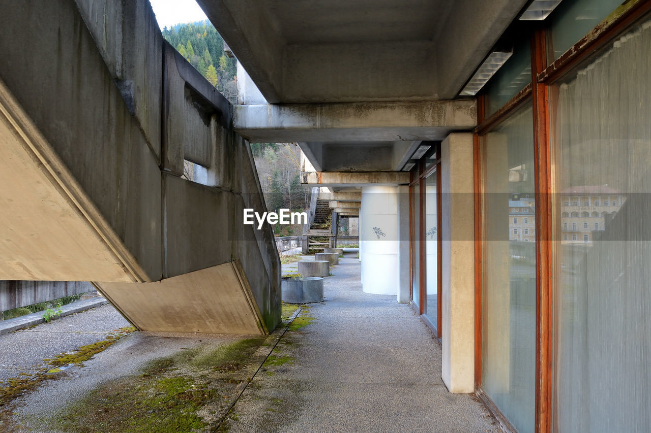 EMPTY ALLEY ALONG BUILDINGS