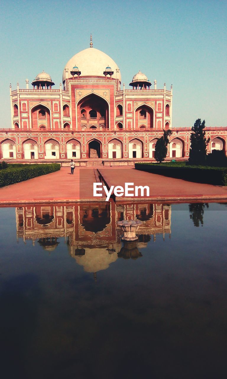 REFLECTION OF BUILDINGS IN WATER